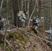 Soldiers Aid One Another Up Ridge