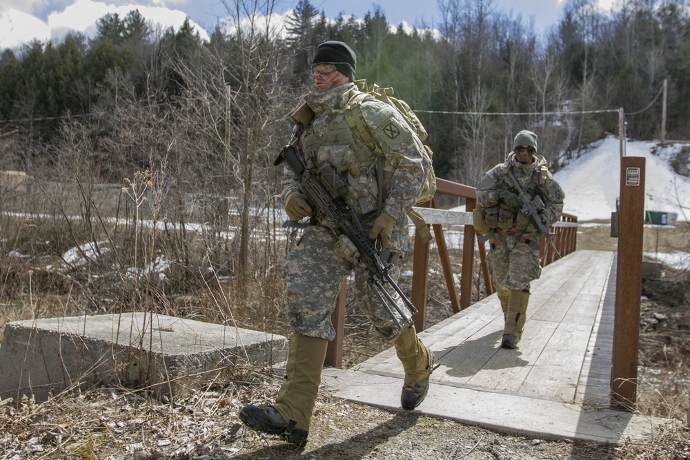 Soldiers Run Across Bridge