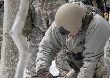 Soldier Prepares Pack