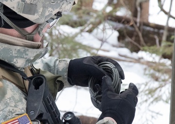 Soldier Prepares a Length of Blasting Cord