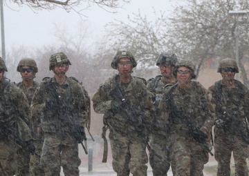 Manchus trek 25 miles to commemorate historic march