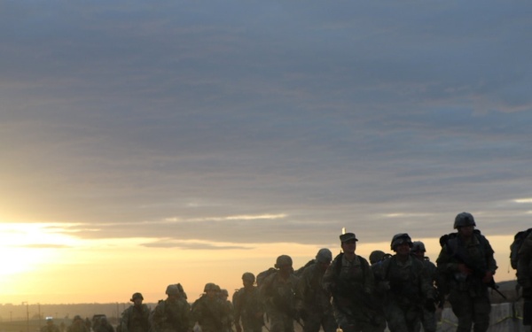 Manchus trek 25 miles to commemorate historic march