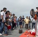 USS Bonhomme Richard (LHD 6) hosts open ship tours during White Beach Festival in Okinawa, Japan.