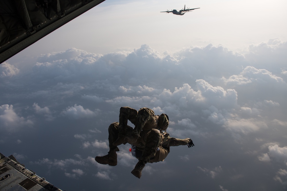 Pararescue Airmen practice military free fall