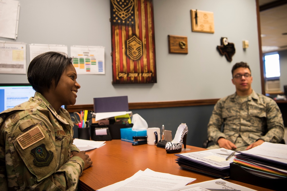 First Sergeant Speaks with Airman