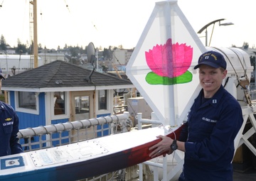 CGC Steadfast presented with mini-boat from middle schoolers