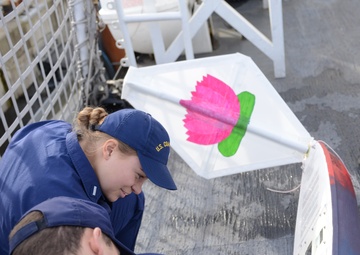 CGC Steadfast presented with mini-boat from middle schoolers