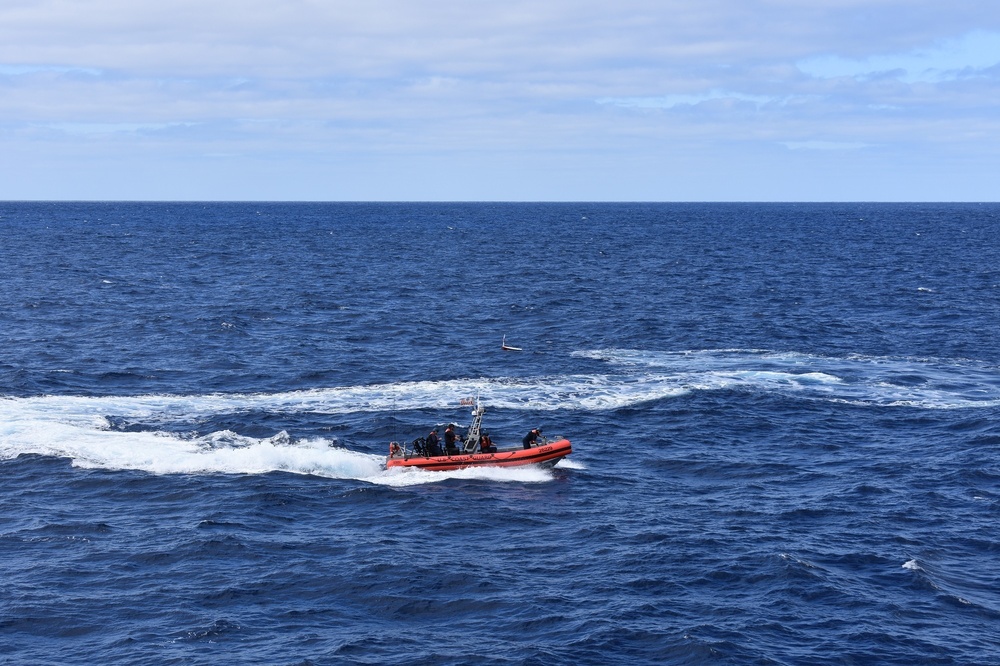 Coast Guard Cutter Steadfast launches the mini-boat Pacific Lotus