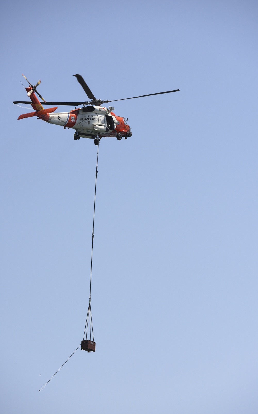 Coast Guard MH-60 jayhawks helo crews airlift new aid to navigation light to Anaheim Bay