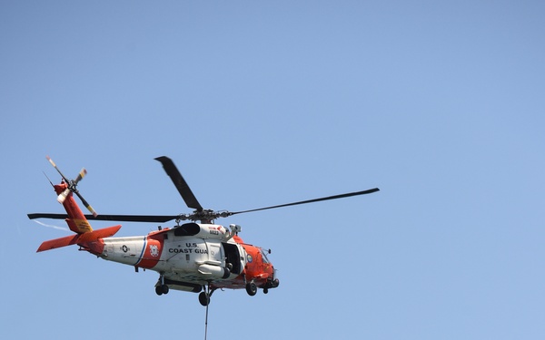 Coast Guard MH-60 jayhawks helo crews airlift new aid to navigation light to Anaheim Bay