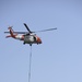 Coast Guard MH-60 jayhawks helo crews airlift new aid to navigation light to Anaheim Bay