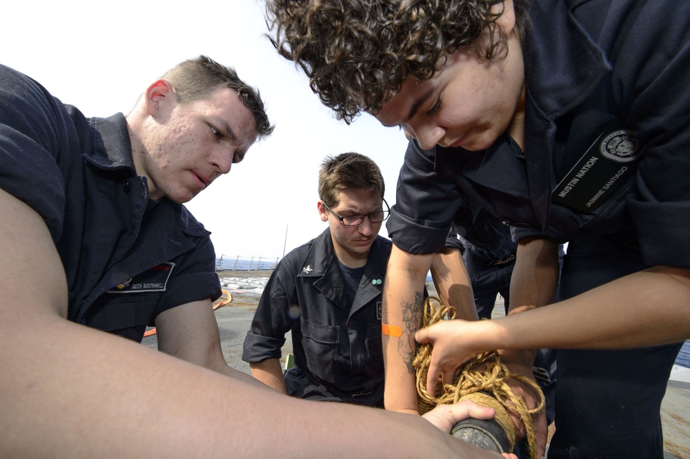 USS Mustin (DDG 89) Sailors compete in the ship’s annual Damage Control Olympics