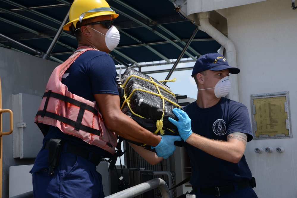 Coast Guard offloads $13.3 million in cocaine, heroin, transfers custody of 2 smugglers, following interdiction in Caribbean Sea