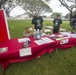 Service members and base personnel promote environmental awareness