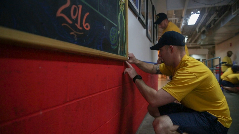 Helping hand: Marines and Sailors partake in a volunteer project