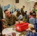 Helping hand: Marines and Sailors partake in a volunteer project