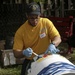 Helping hand: Marines and Sailors partake in a volunteer project