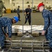 GHWB Sailors move missile launchers