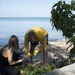 Guam Sailor, Wife Clean Up Coastline for Earth Day