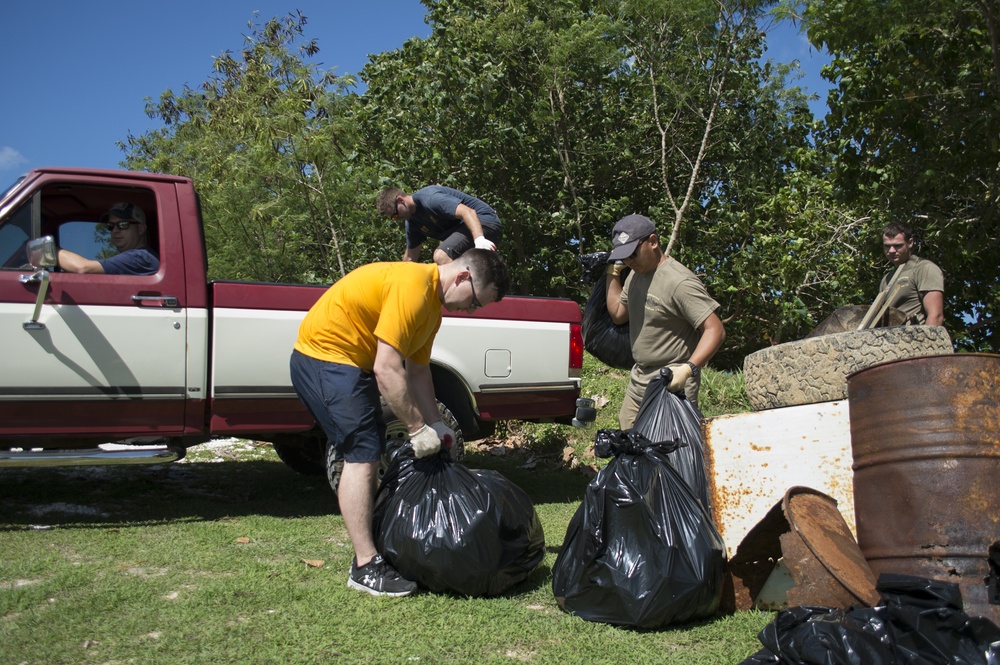 Guam Sailors Consolidate Trash for Pick-up on Earth Day 2018