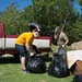 Guam Sailors Consolidate Trash for Pick-up on Earth Day 2018