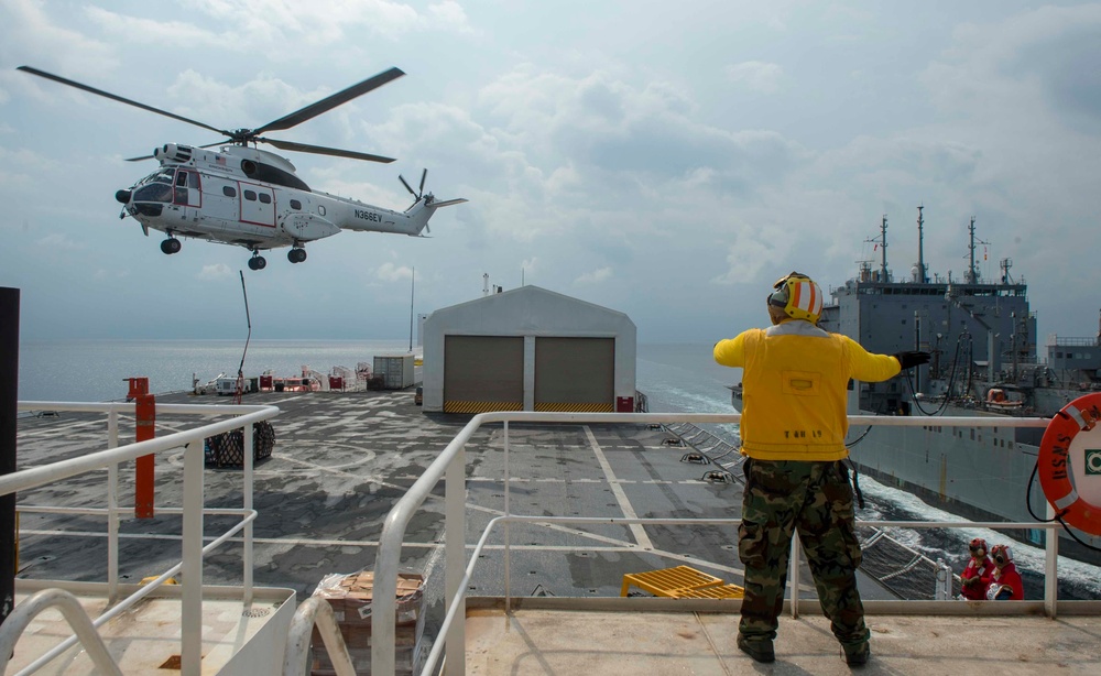 Sailors conduct a Vertical Replenishment-at-Sea aboard USNS Mercy
