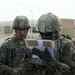 U.S. Soldiers review map data during training with Jordanian counterparts