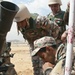 Jordanian soldiers inspect U.S. mortar during joint training