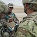 Jordanian, U.S. soldiers review firing data for simulated mortar mission