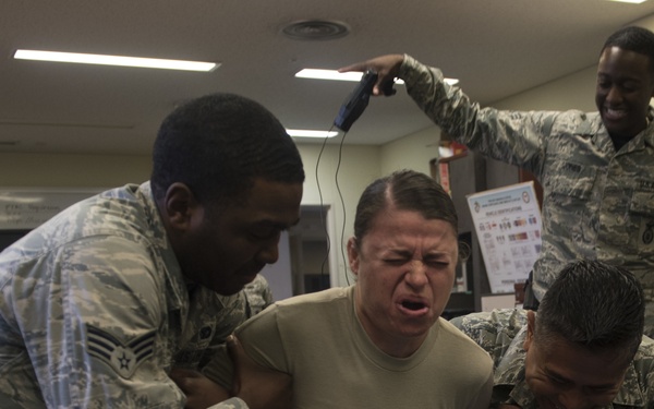 18 SFS and 18 AMXS Airmen switch jobs for a day