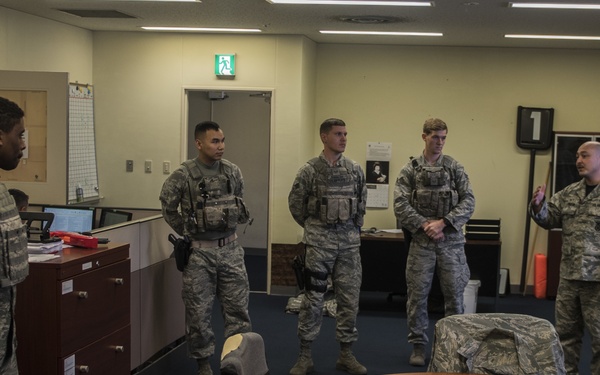 18 SFS and 18 AMXS Airmen switch jobs for a day