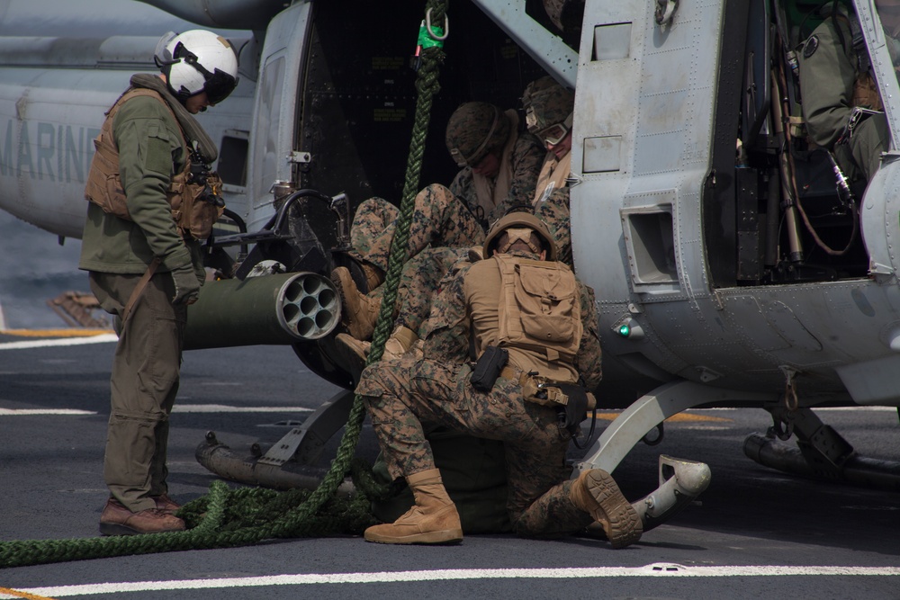 31st MEU Marines refine fast rope techniques while underway aboard Green Bay