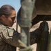 Female Marines bringing the fire to artillery