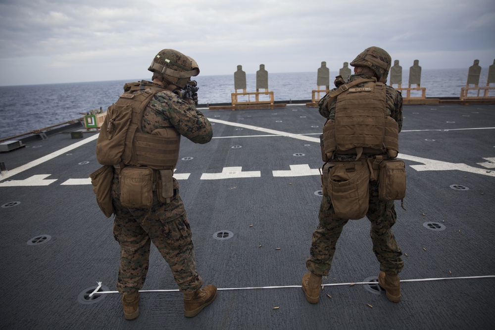 31st MEU Marines conduct a deck shoot while underway