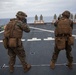 31st MEU Marines conduct a deck shoot while underway