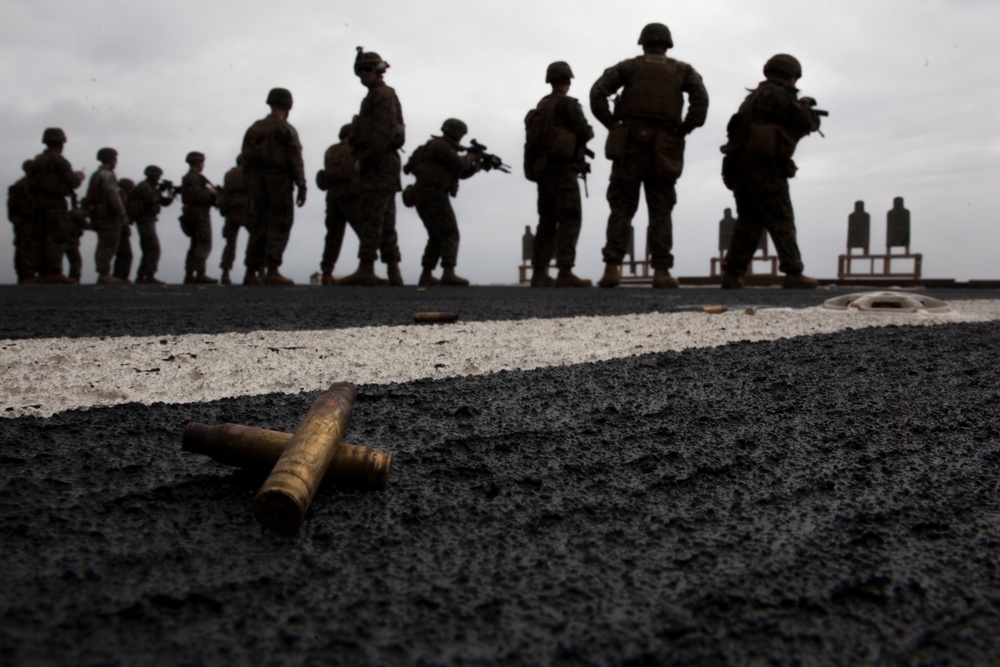 31st MEU Marines conduct a deck shoot while underway