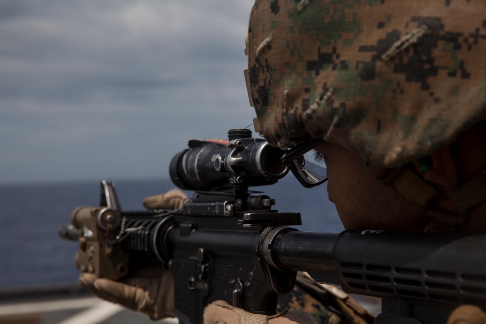 31st MEU Marines conduct a deck shoot while underway