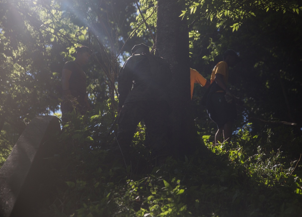 Preserving History: U.S. Marines and Sailors work with Woods Conservancy to clean up historic bunkers