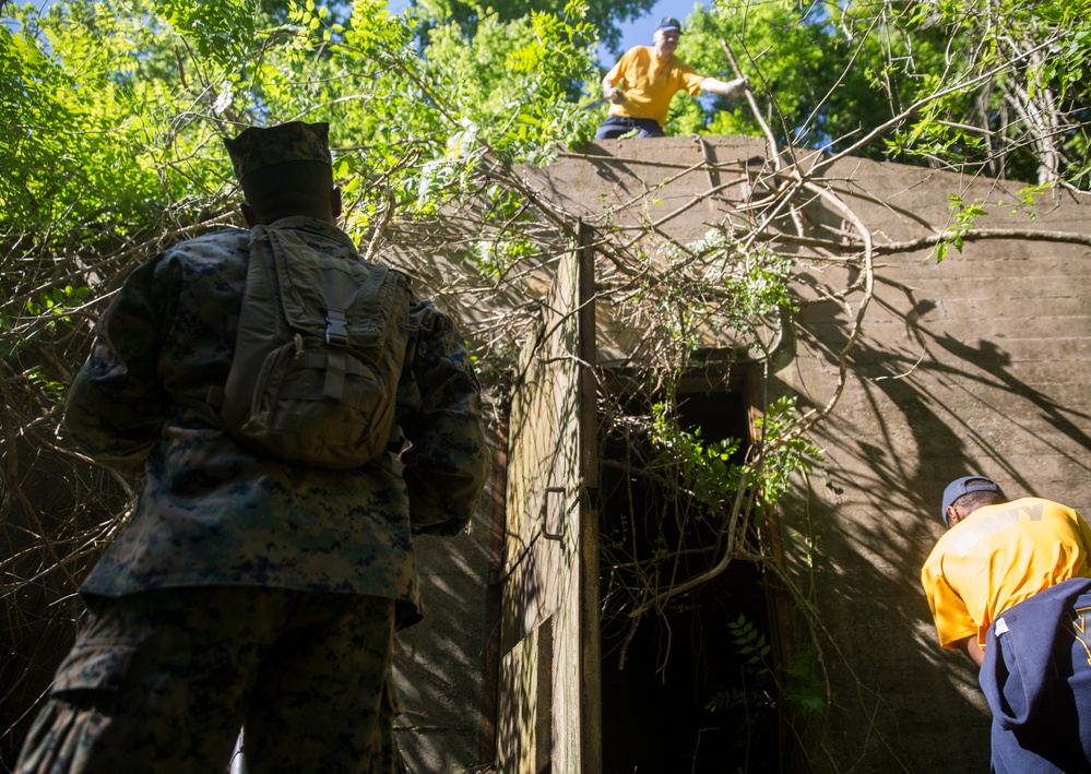 Preserving History: U.S. Marines and Sailors work with Woods Conservancy to clean up historic bunkers