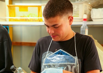 Marines help sort recyclables at Houjin Angel Kobo