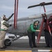 LAU-61 rocket launcher onload to an MH-60S Seahawk helicopter of HSC-22