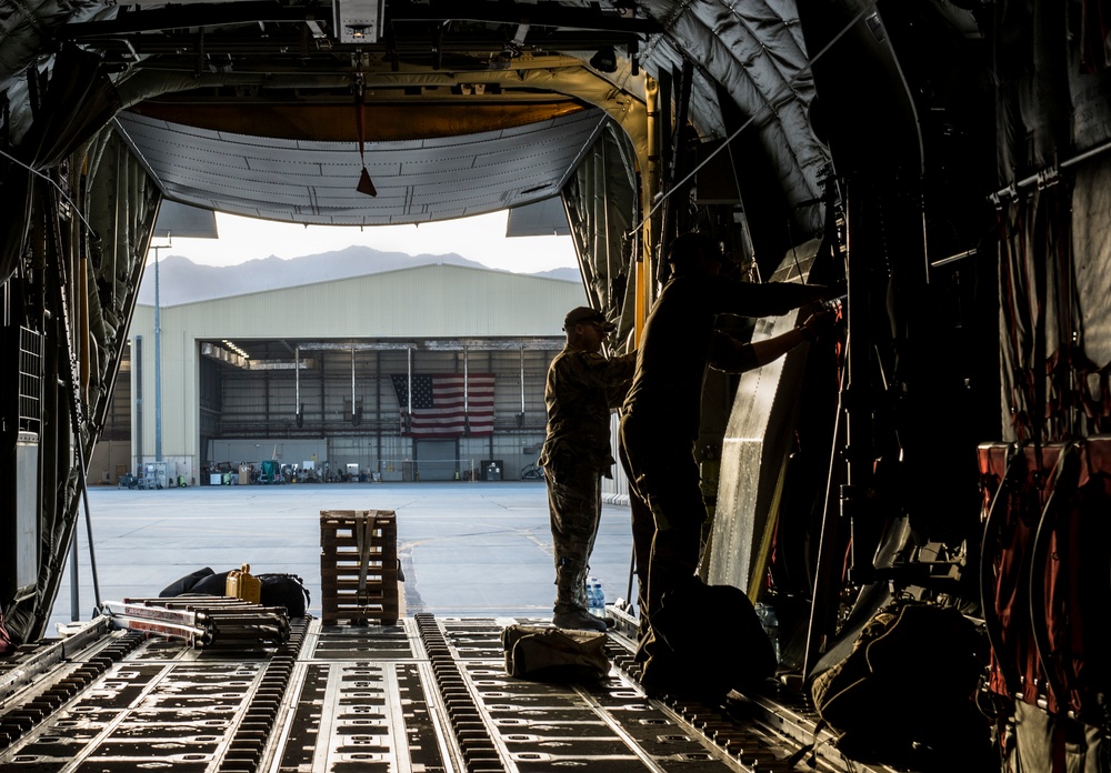 C-130s drop supplies over Afghanistan