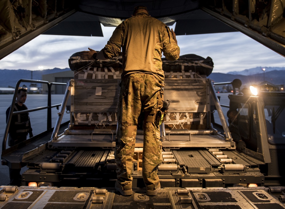 C-130s drop supplies over Afghanistan