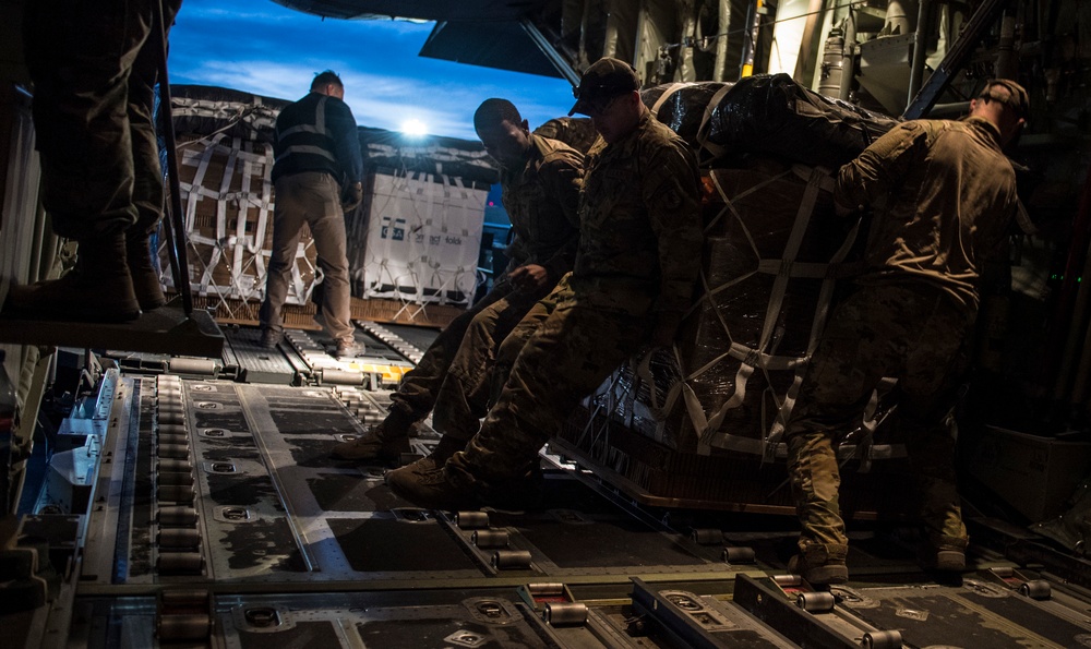 C-130s drop supplies over Afghanistan