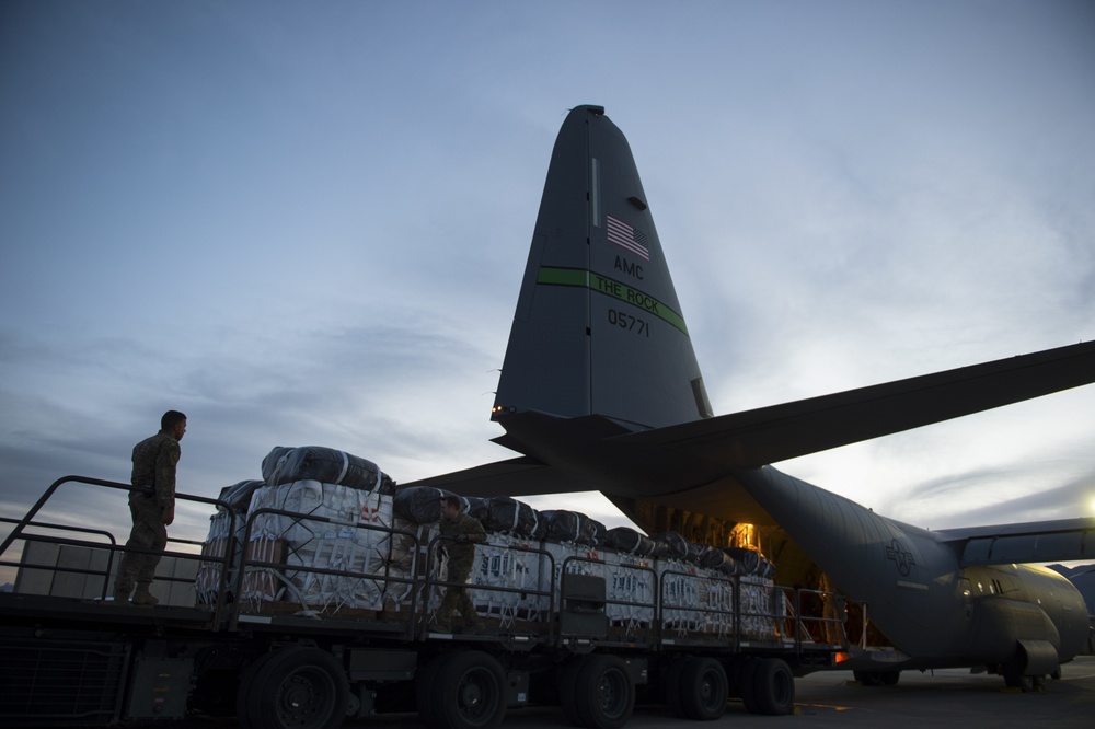 C-130s drop supplies over Afghanistan