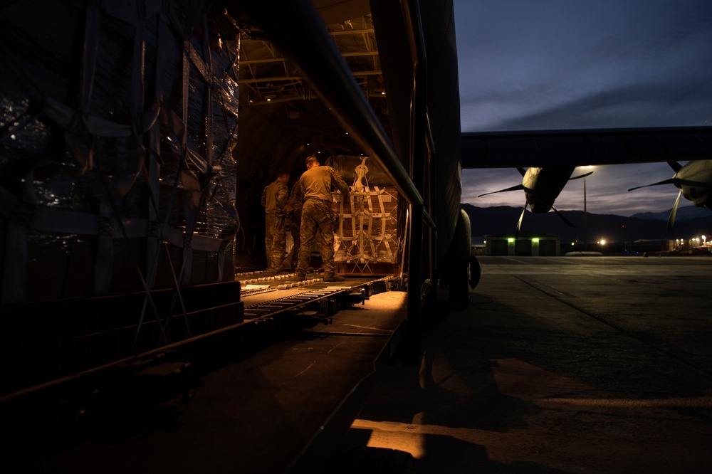 C-130s drop supplies over Afghanistan