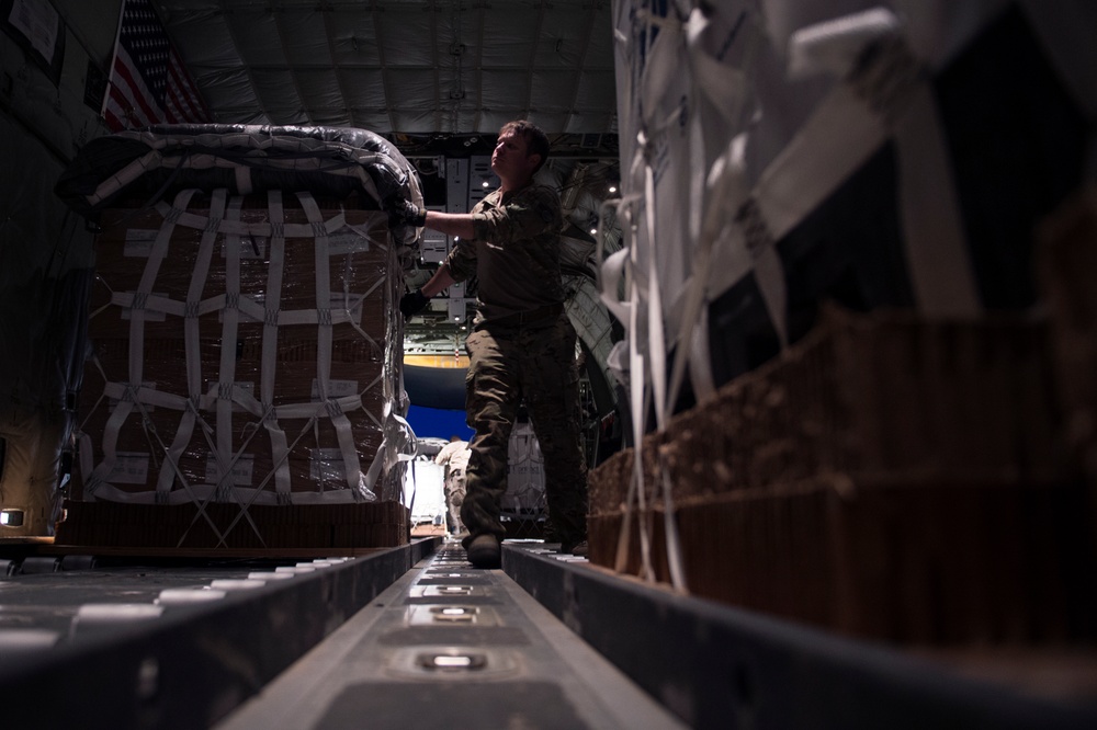 C-130s drop supplies over Afghanistan