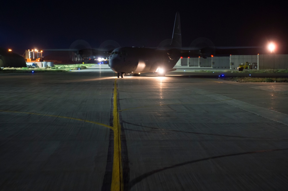 C-130s drop supplies over Afghanistan