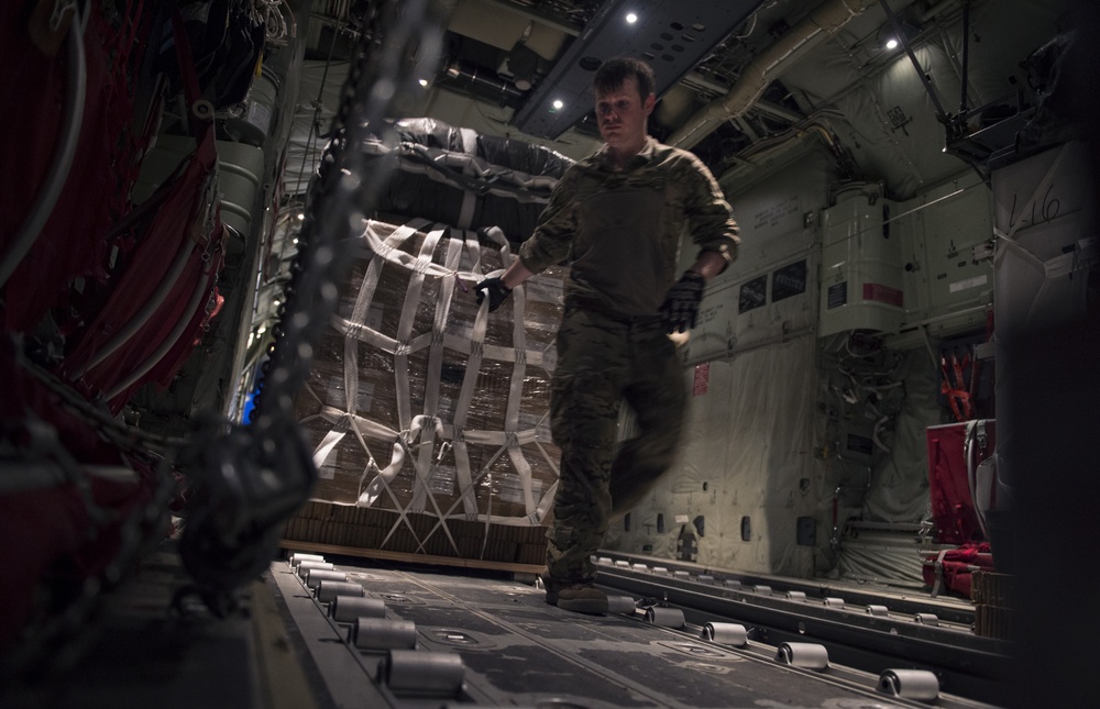 C-130s drop supplies over Afghanistan