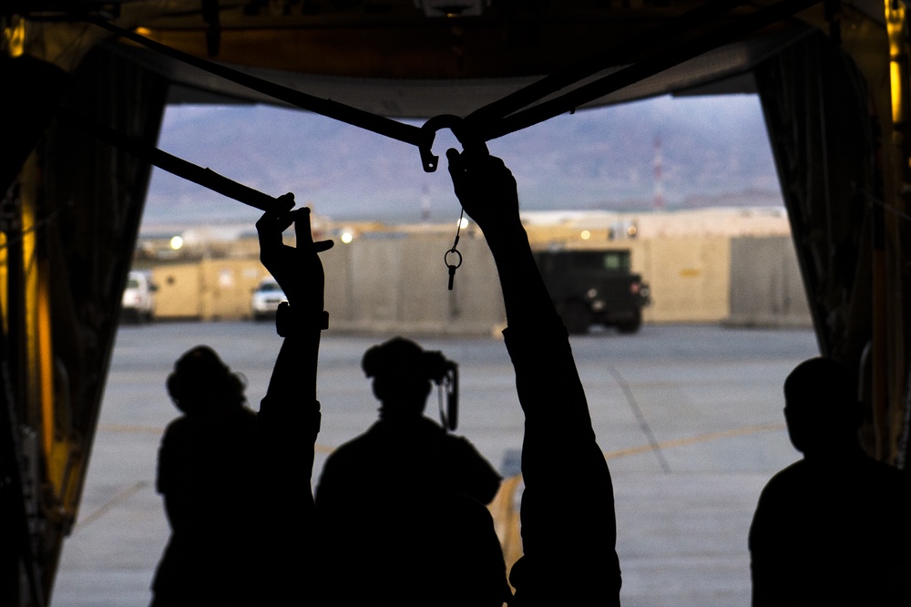 C-130s drop supplies over Afghanistan